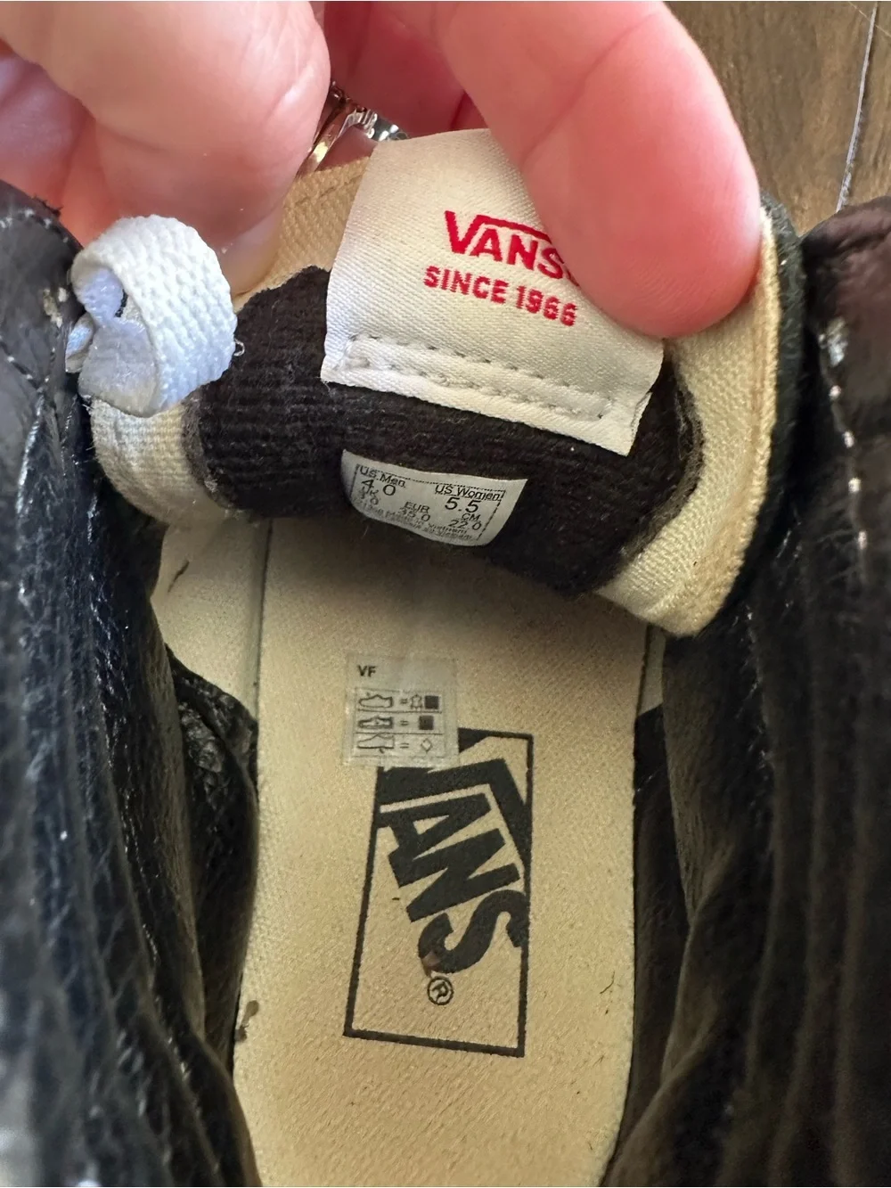 Vans Black & White High-Top Skate Sneakers
